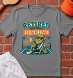 Retired But Still Dinking T-Shirt